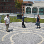 John Flanagan, Susan Hillson and Rozella Cribbs-Grant walk the labyrinth on the American Psychological Association building’s green roof.